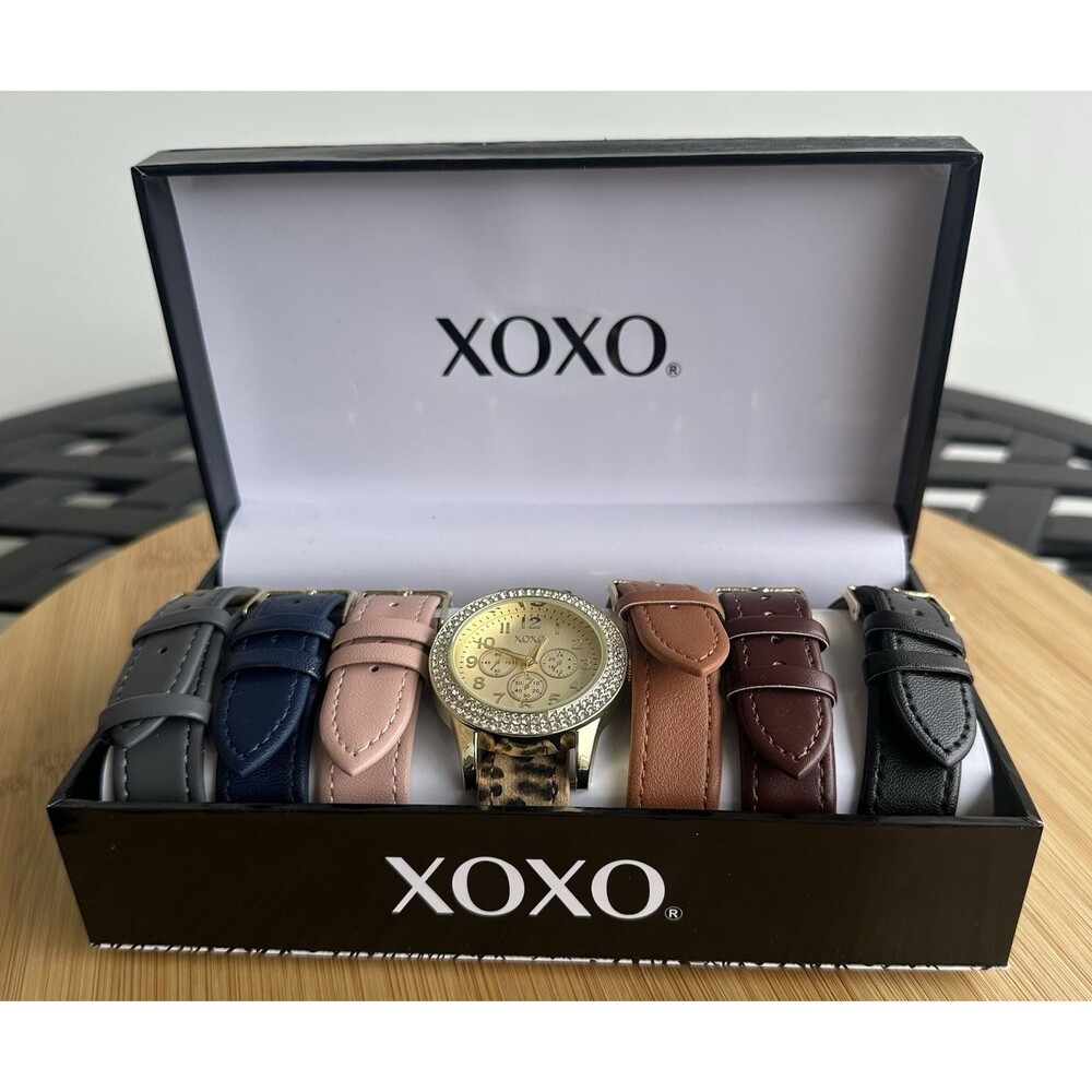 XOXO Women's Gold Tone Jeweled Bezel Watch With 7 Interchangeable Bands NIB